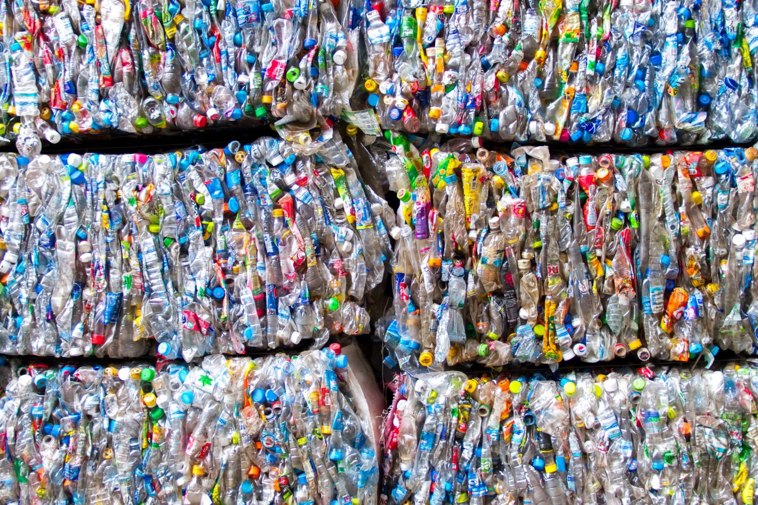 Bails of empty, crushed plastic bottles
